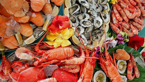 فوائد تناول الأسماك والمأكولات البحرية على الجسم